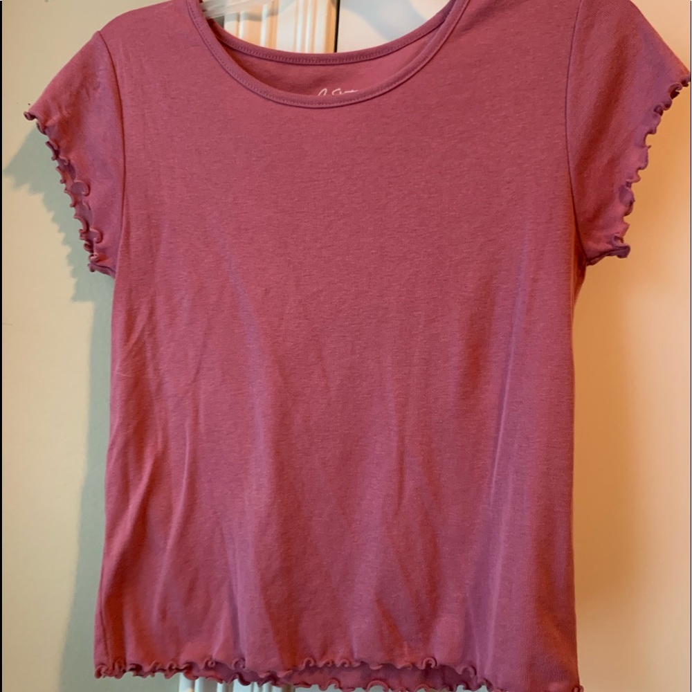 Pink tee.